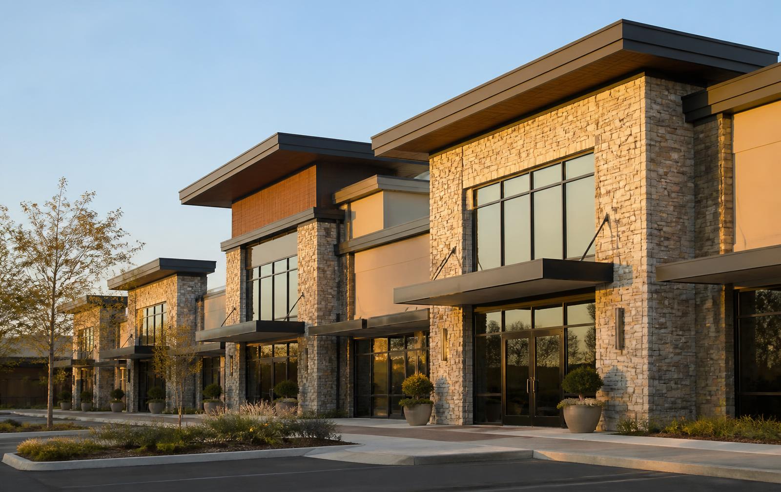 Modern commercial retail and office building in late afternoon light